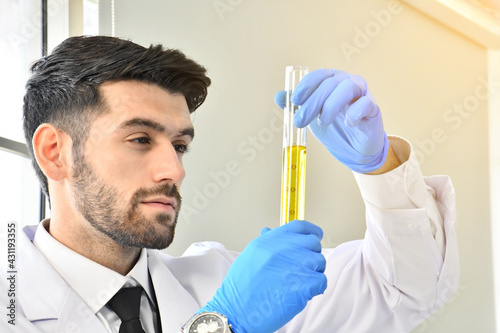 Chemistry industry lubricant oil test in laboratory concept. The professional science chemistry Make analysing sample petroleum gasoline fuel in chemical laboratory.