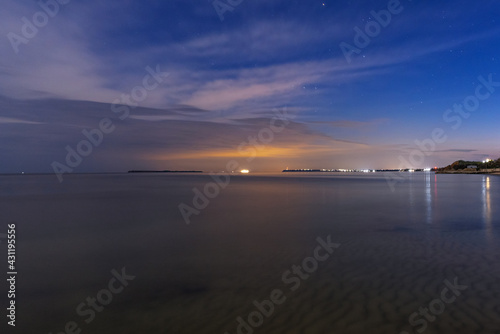 View of the sea on a moonlit night made with long exposure. Ochakov. Ukraine