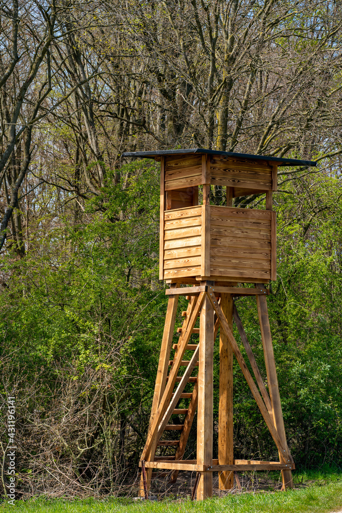 Hunter house in forest. Wooden Hunting Lodge Hunter house in forest. Wooden Hunting Lodge