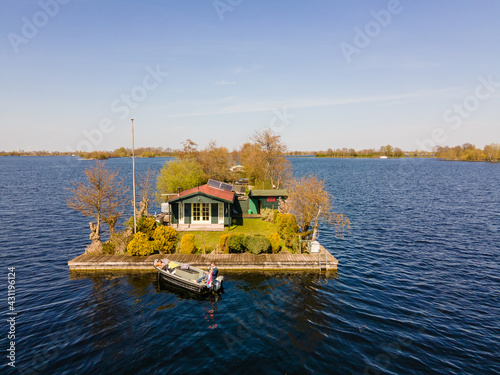 Aerial view of small islands in the Lake Vinkeveense Plassen, near Vinkeveen, Holland. It is a beautiful nature area for recreation in the Netherlands. Vinkeveen is mainly famous for the Vinkeveense photo