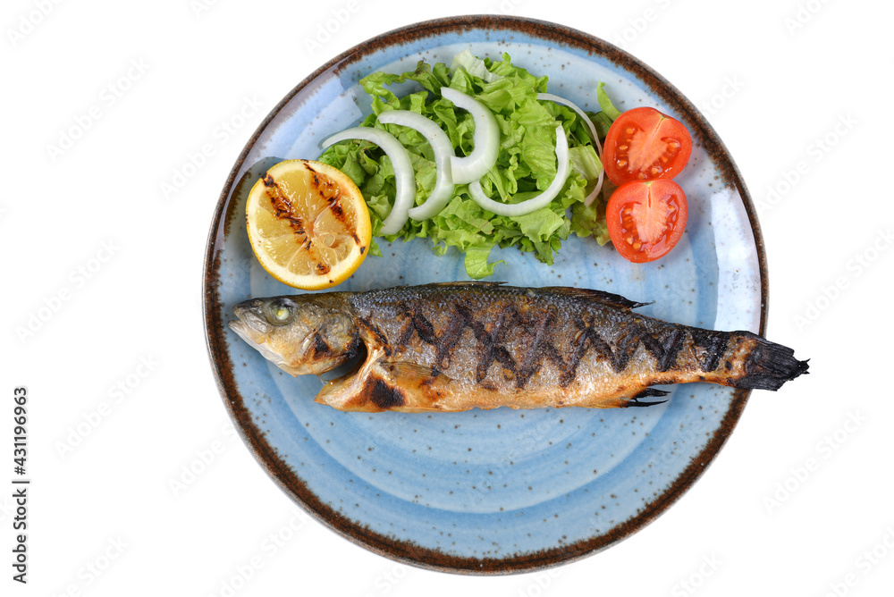 grilled sea bass and vegetables. It is served with various sauces. white background top view. grilled sea bass and vegetables. It is served with various sauces. white background top view.