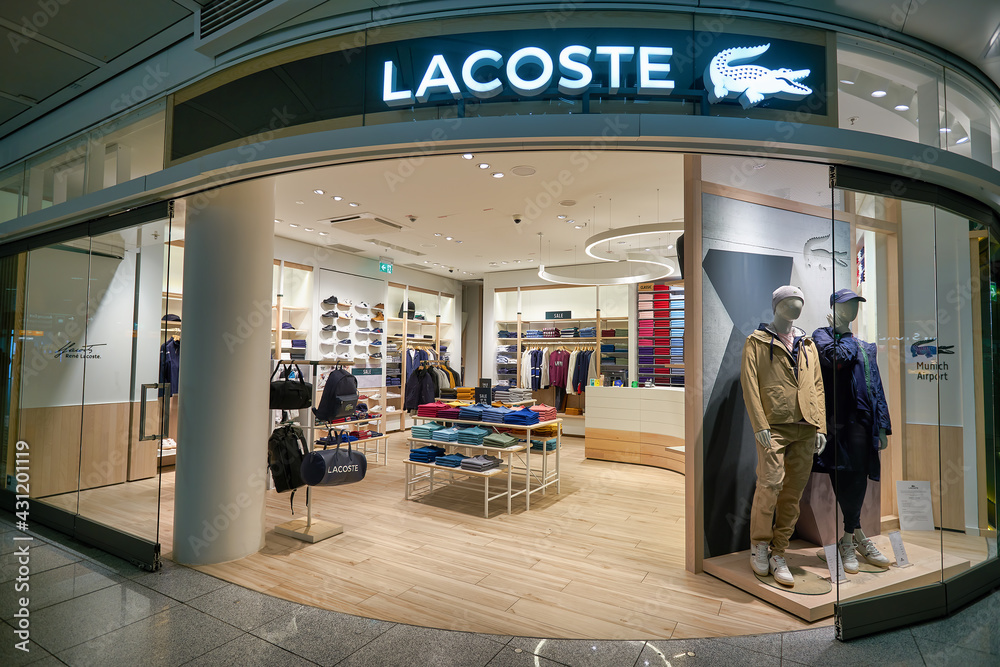 MUNICH, GERMANY - CIRCA JANUARY, 2020: entrance to Lacoste store in Munich  Airport. Stock Photo | Adobe Stock