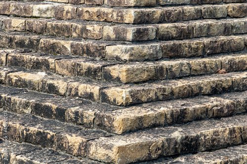 Pyramidal structure made of stones. Stepped structure made of stone blocks. Stone stairs. Pyramid close up.