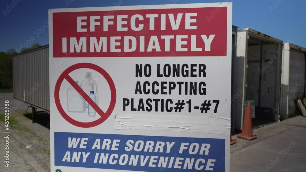Sign for no longer accepting plastic 1 through 7 at a recycling facility. Sign for no longer accepting plastic 1 through 7 at a recycling facility.
