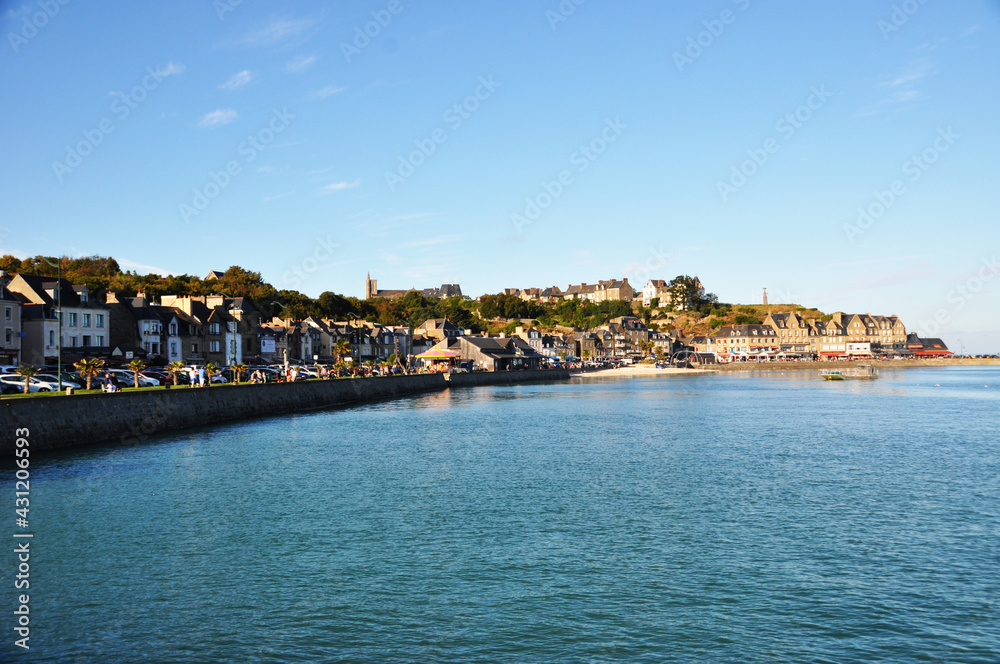 View of the embankment, sea and townhouses. Panoramic view on a summer day.