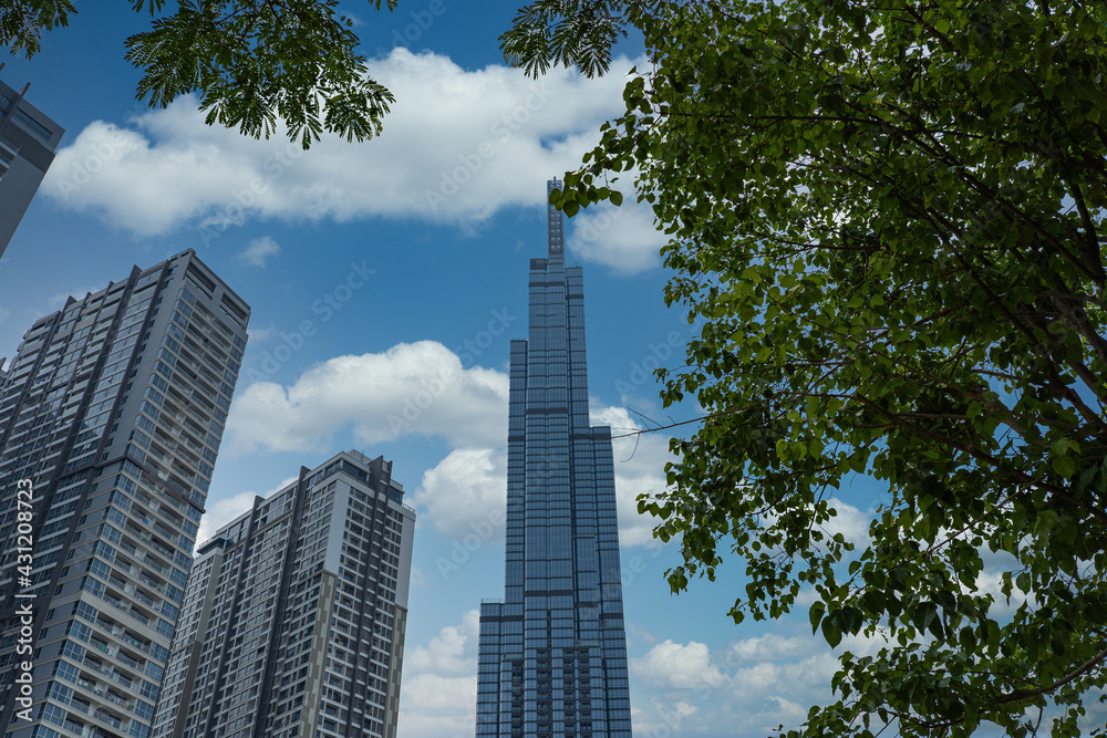 Fototapeta premium Futuristic skyscraper or buildings under summer blue sky