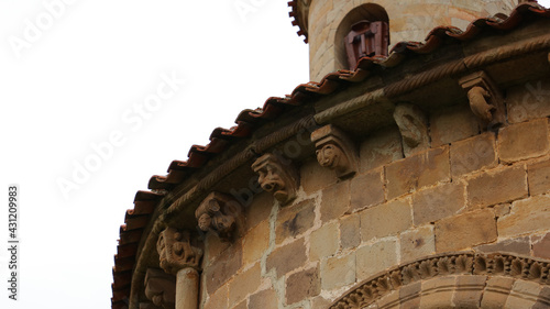 Canecillos del Convento de San Martín de Elines, Cantabria, España photo