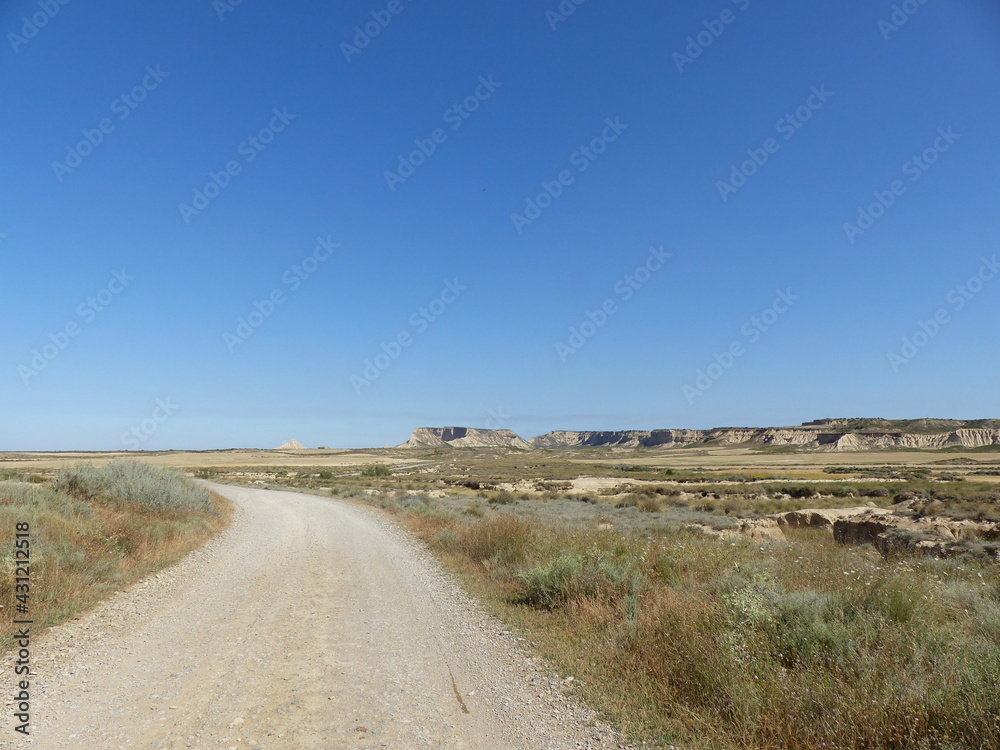 road in the dry Almeria desert in Spain