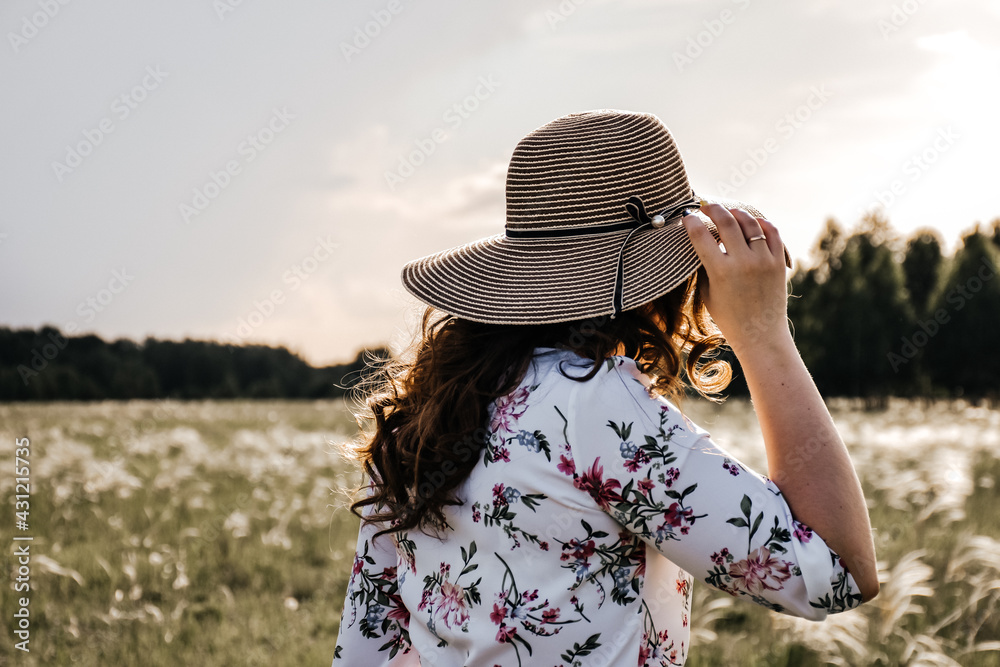 portrait of a woman in a field
