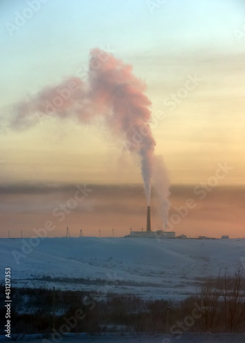 Pipe and smoke, mines of Vorkuta in winter