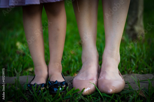 Sao Paulo, SP, Brazil - February 15 2020: photograph of daughter and mother feet side by side