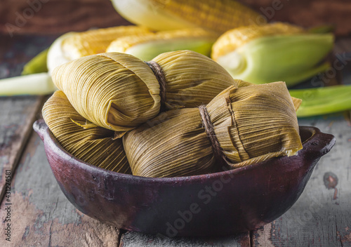 Latin American food. Traditional homemade humitas of corn photo