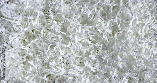 Fotografia Shredded paper texture background, top view of white paper strips