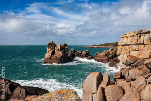 The rock formation known as The Chair, Peninnis Head, St. Mary's, Isles of Scilly, UK, with St. Mary's Sound beyond photo