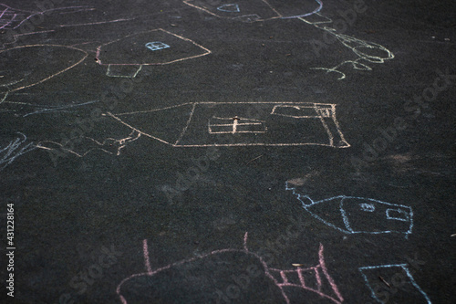chalk pictures on the ground, coloring houses © Artur Kiselev