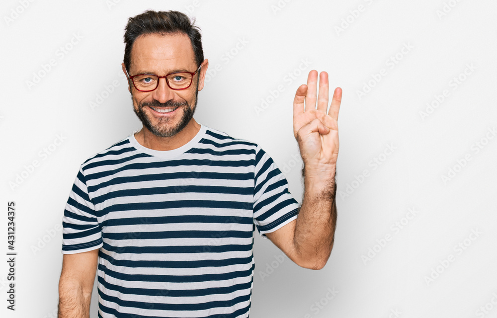 Middle age man wearing casual clothes and glasses showing and pointing up with fingers number four while smiling confident and happy. Middle age man wearing casual clothes and glasses showing and pointing up with fingers number four while smiling confident and happy.