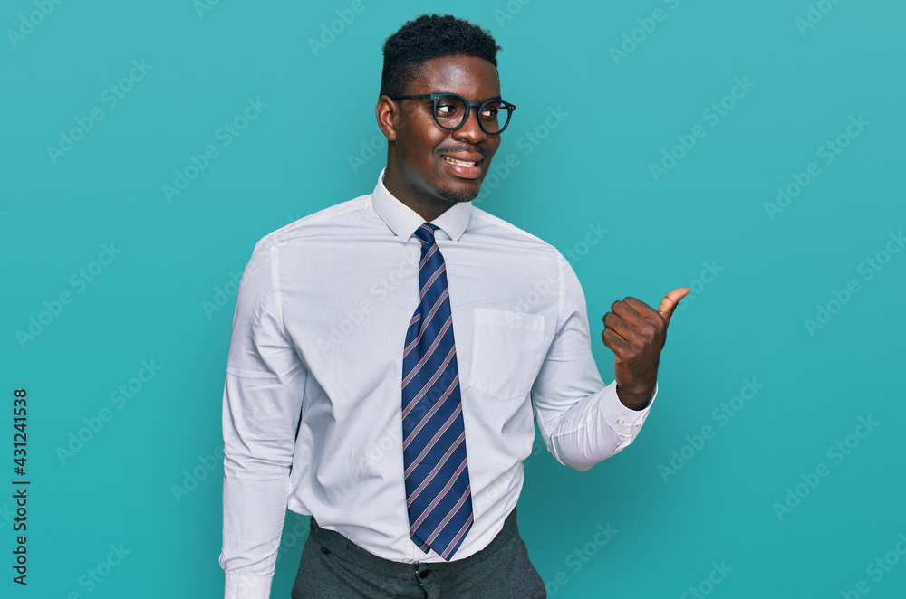 Handsome business black man wearing white shirt and tie smiling with ...