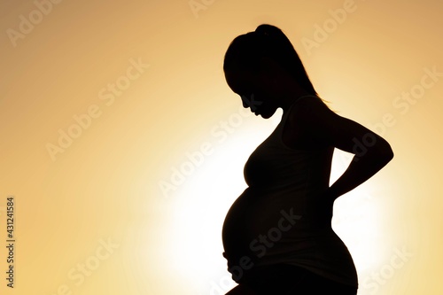 Pregnancy. A pregnant woman silhouette.