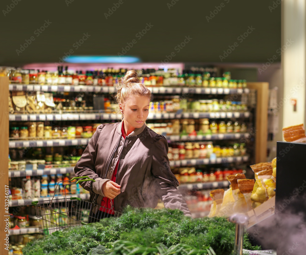 Woman buying fruits and vegetables  at the market