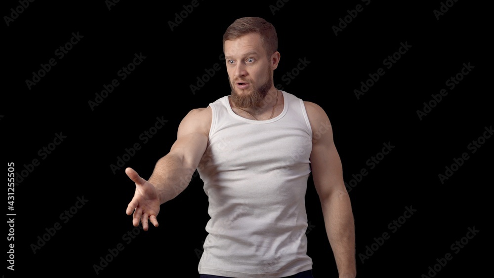 It's you. A man looks into the frame and shows his finger .. Caucasian man in a T-shirt. High quality photo It's you. A man looks into the frame and shows his finger .. Caucasian man in a T-shirt. High quality photo