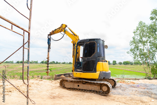Drill excavator prepare digging fence posts