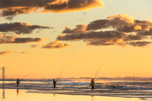 Surf fishing at sunrise