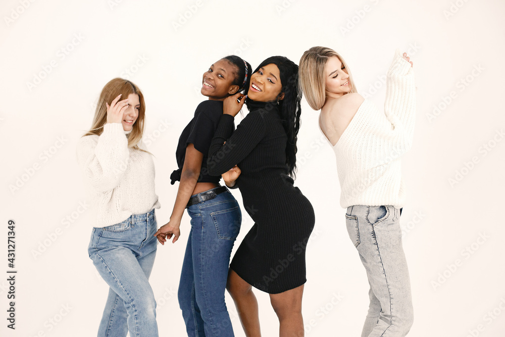 Fototapeta premium Portrait of attractive young women on a white background