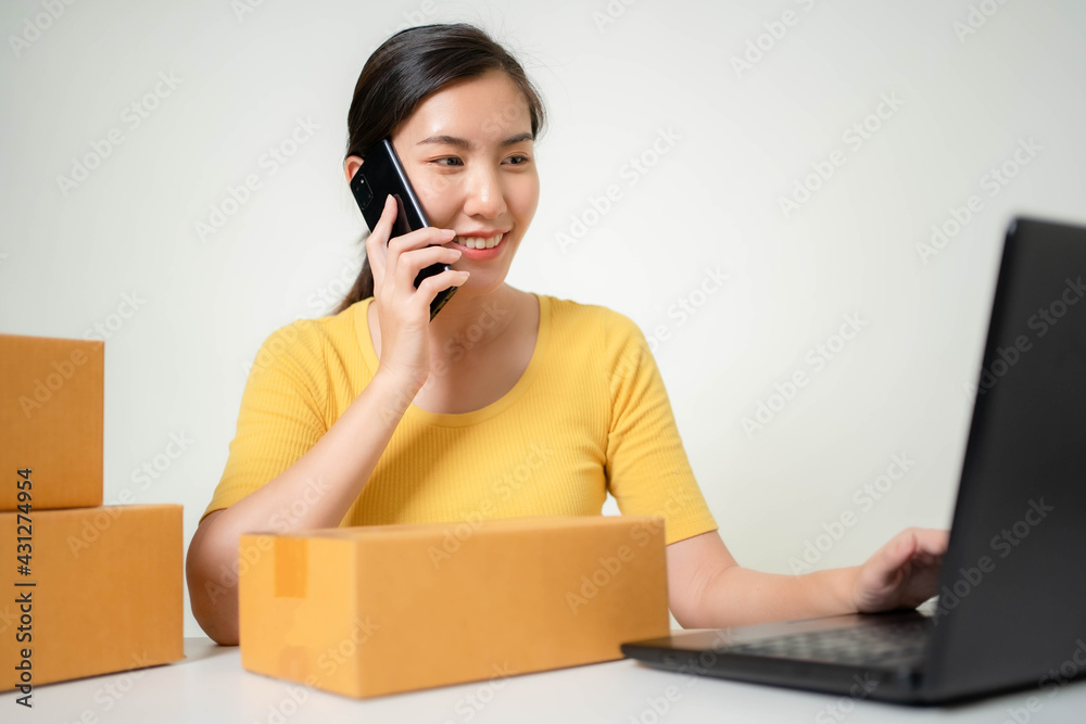 Asia woman Start up for Business Online. People with online shopping SME entrepreneur or freelance working concept. Banner size Asia woman Start up for Business Online. People with online shopping SME entrepreneur or freelance working concept. Banner size