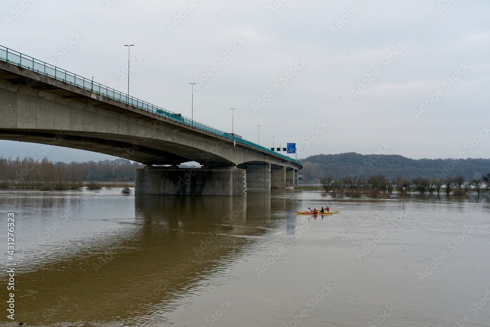 Heteren Netherlands - 5 February 2021 - Canoers in the river Rhine near Renkum