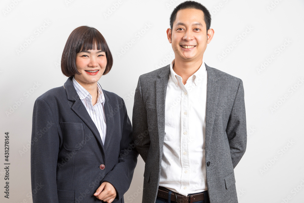 Asians executive businessman and adviser businesswoman standing on white background. Asians executive businessman and adviser businesswoman standing on white background.