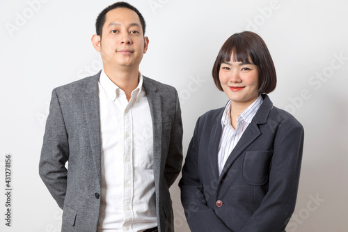 Asians executive businessman and adviser businesswoman standing on white background.