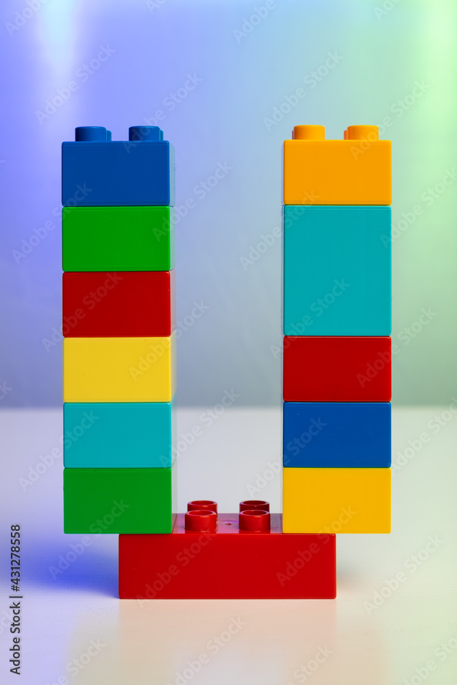 the letter U built from toy brick letters the letter U built from toy brick letters