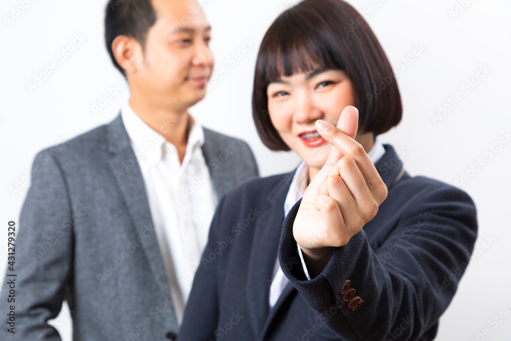 Happy business man and woman showing thumb up over white background. Happy business man and woman showing thumb up over white background.