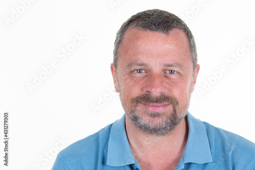 confident man 50s handsome wearing casual bue shirt posing and looking on camera