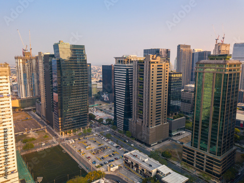 Bonifacio Global City, Taguig, Metro Manila, Philippines - Under construction and completed office buildings in BGC. photo