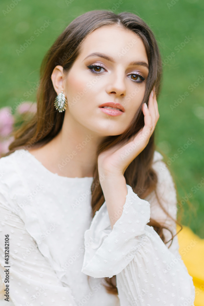 fresh feminine clean facial skin and light nude makeup looks at the camera fresh feminine clean facial skin and light nude makeup looks at the camera
