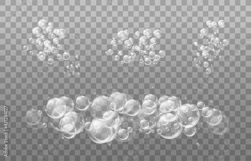 Realistic tansparent soap foam. Bubbles of soapy water. Design elements for washing powder, shampoo, skin cosmetics..Isolated on a transparent background. photo