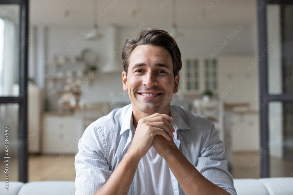 Guy looking at the camera online meeting with friends chat,