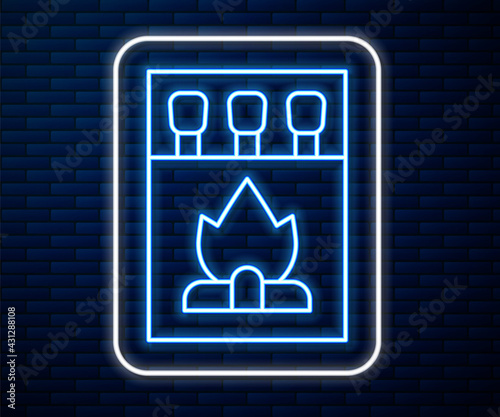 Glowing neon line Open matchbox and matches icon isolated on brick wall background. Vector