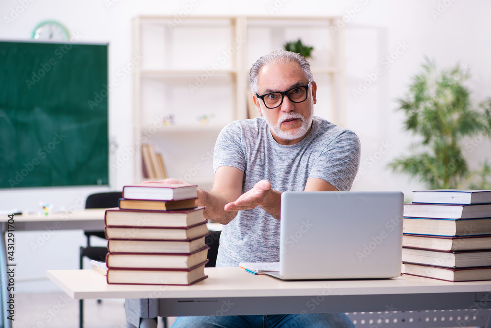 Old male student in tele-education concept Old male student in tele-education concept