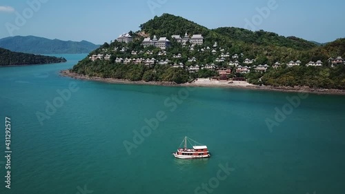 View of the bay Aerial view of Ko Yao Yai ,Phuket,Thailand and boat on the sea background Santhiya resort photo