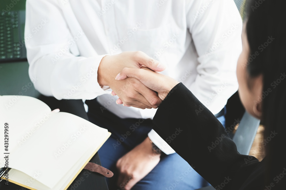 Young businessmen collaborate with partners to increase their business investment network for Plans to improve quality next month in their office. agreement concept