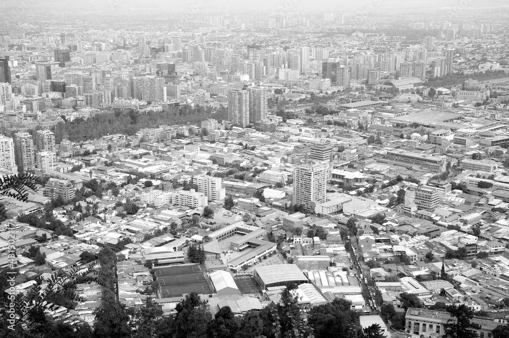 Monochrome aerial view of Santiago city as seen from San Cristobal hill in Santiago, Chile, South America