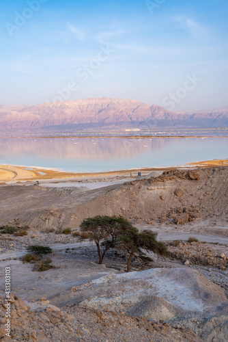 Evening reflections of the Jordanian mountains in the Dead Sea in Israel 