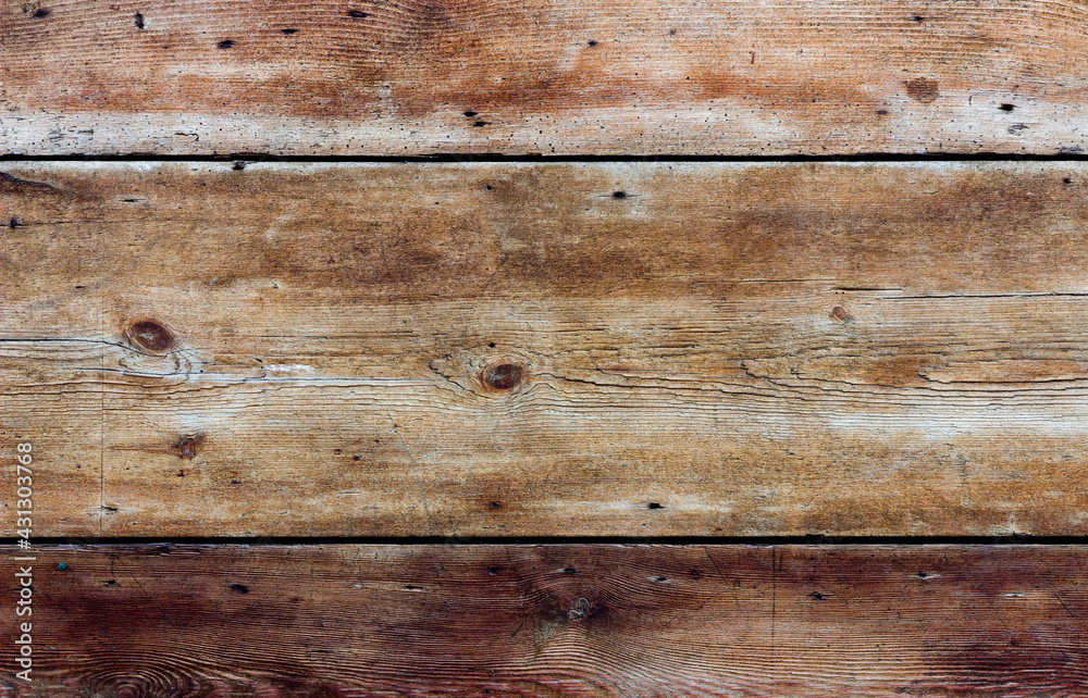 Light brown wooden panelling arranged horizontally for background texture Light brown wooden panelling arranged horizontally for background texture