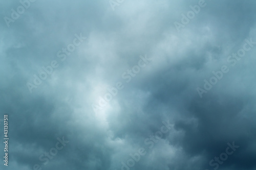 Heavy dark blue thundercloud before heavy rain. Stormy weather and dramatic sky. Natural background