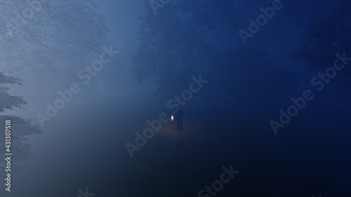 person with lantern in the mist forest