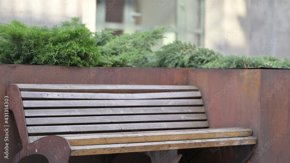 Fototapeta premium Empty Bench Outside Office Loft Building