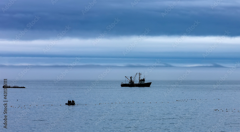 Trawler fishing boat sailing in open waters