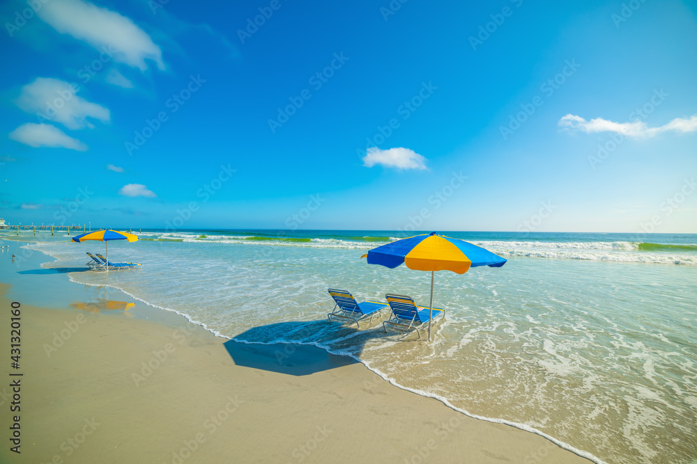 Parasols and beach chairs in Daytona Beach foreshore